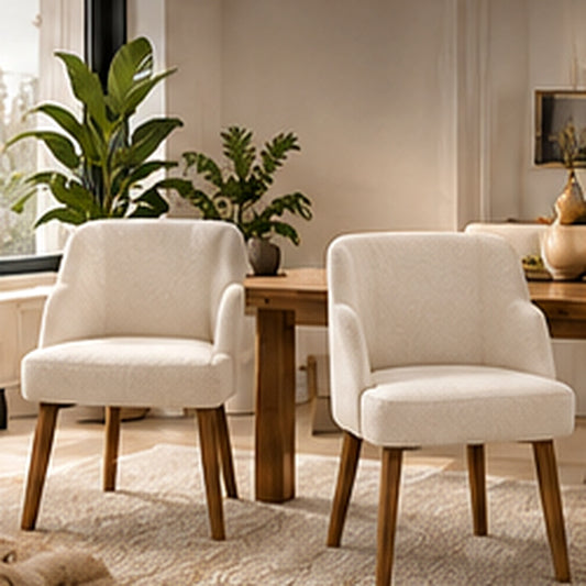 Rovenmere set of two boucle dining chairs with natural wood frames in a premium interior
