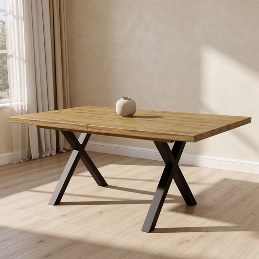Rovenmere oak dining table with black crossed legs in a warm neutral dining room